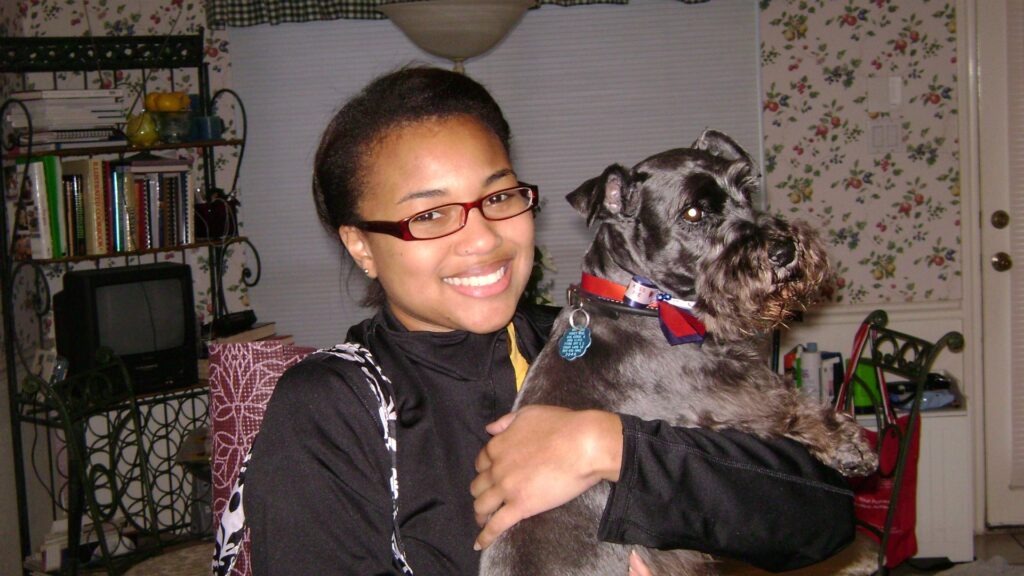 Photo of Danielle with her dog, Prince.
